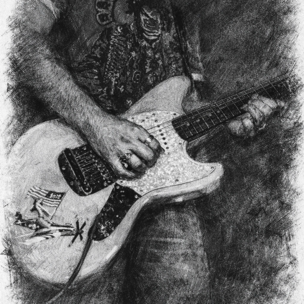 Michael Sysum playing guitar
